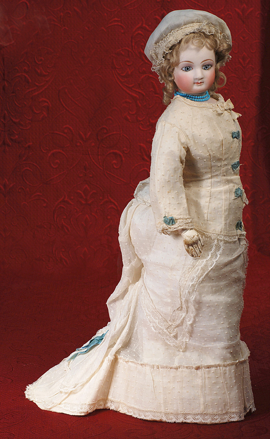 Twenty-four-inch French poupee with rare Dehors neck articulation by E. Barrios for Simmone. Image courtesy Frasher's Doll Auctions.